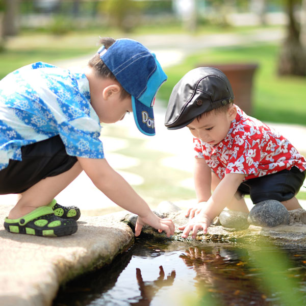 Boys Playing In Water